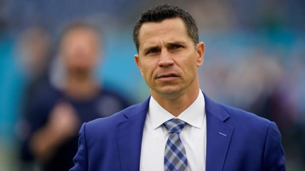 Interim Titans GM Ryan Cowden walks on the field as the team gets ready to face the Jacksonville Jaguars at Nissan Stadium Sunday, Dec. 11, 2022, in Nashville, Tenn.